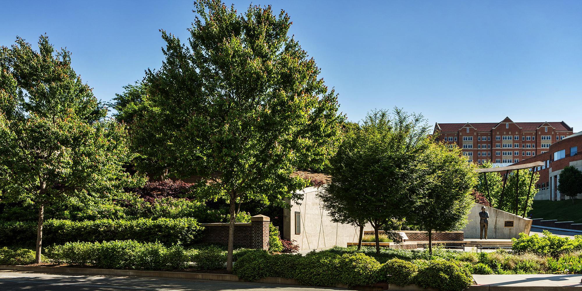 Trees and bushes surrounding Pat Summitt statue